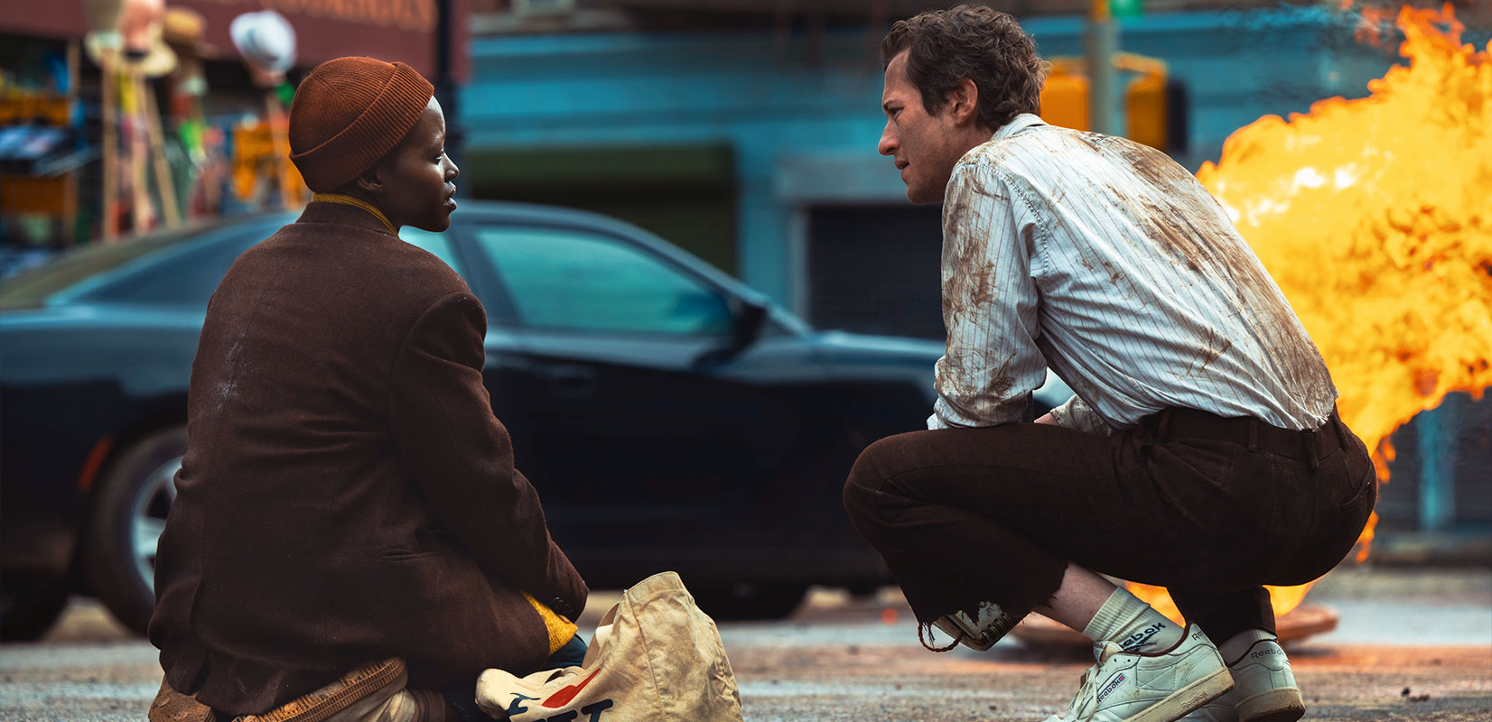 Joseph Quinn as “Eric” and Lupita Nyong’o as “Samira” in A Quiet Place: Day One