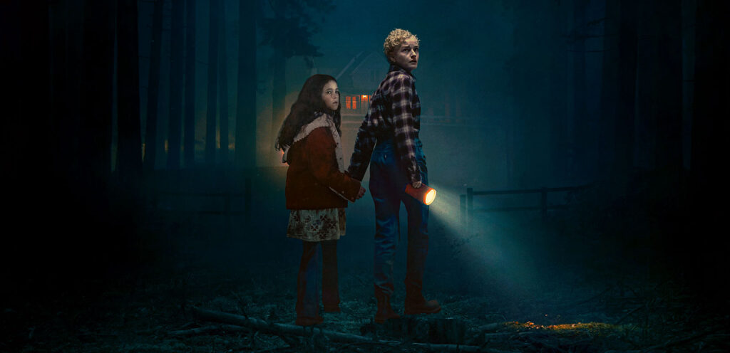 Julia Garner and Matilda Firth on the poster for Wolf Man