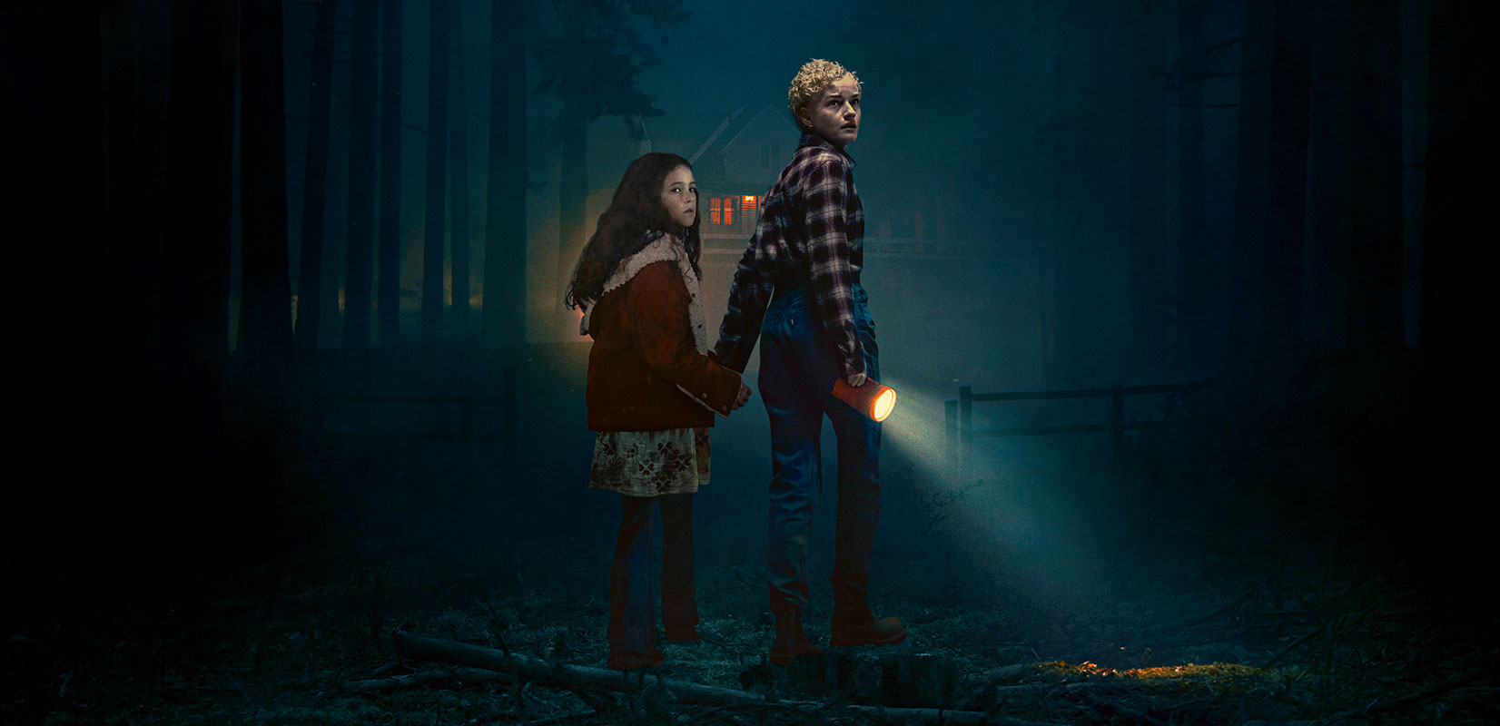 Julia Garner and Matilda Firth on the poster for Wolf Man