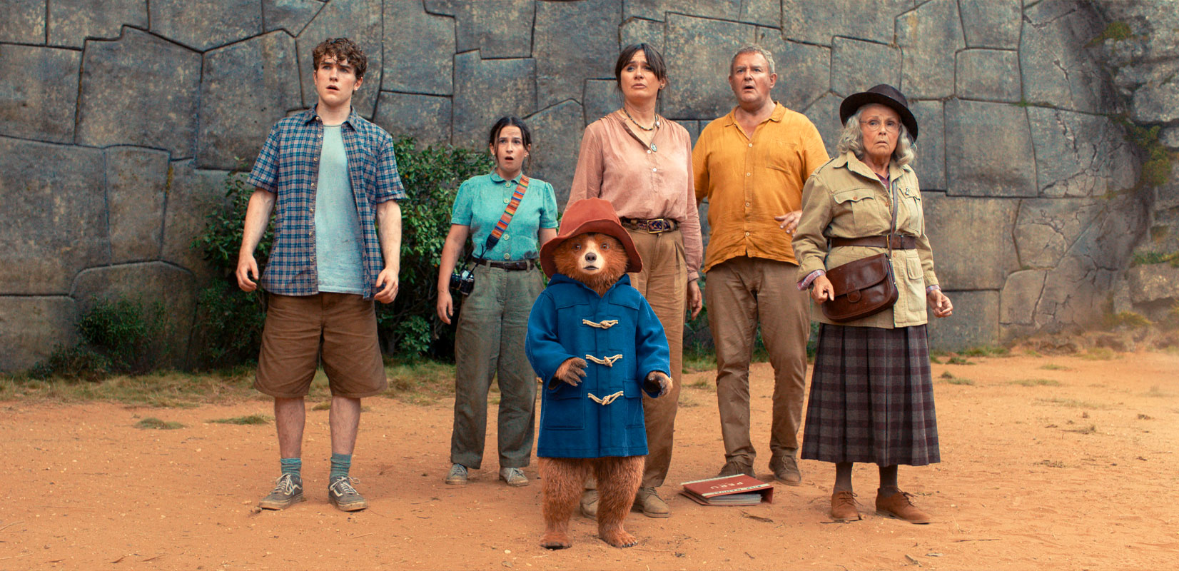 Ben Whishaw as Paddington Bear, Emily Mortimer as Mary Brown, and Hugh Bonneville as Henry Brown in Paddington in Peru